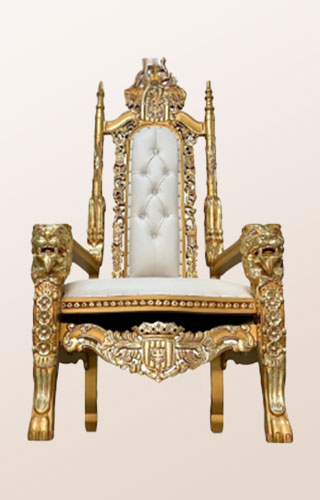 Cream throne with sharp corners and gold decorative trim